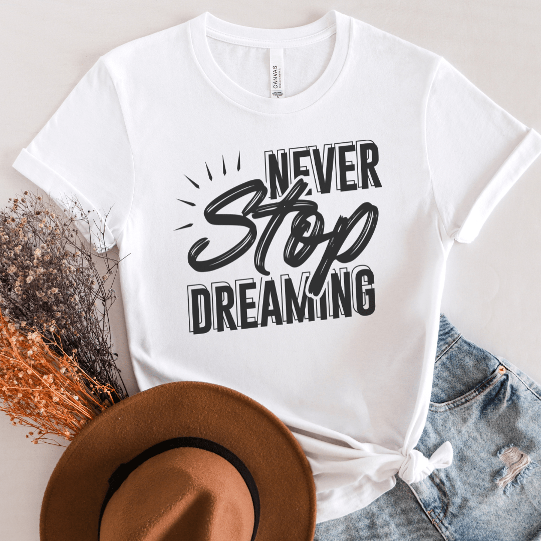 Motivational Quotes T-Shirts - Never Stop Dreaming - Premium from Ninez Designz Custom Creations LLC - Just $20! Shop now at Ninez Designz